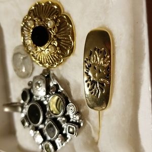 2 pins, one pendant enhancer with magnetic closure.  One pin in Anne Klein